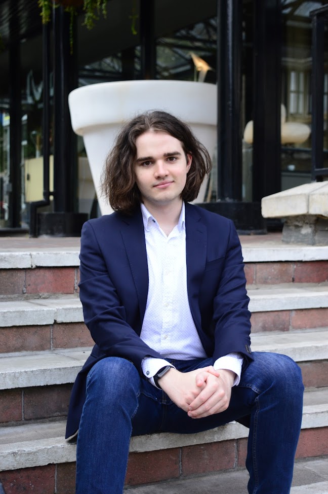 photo of jacob carter sitting on stairs